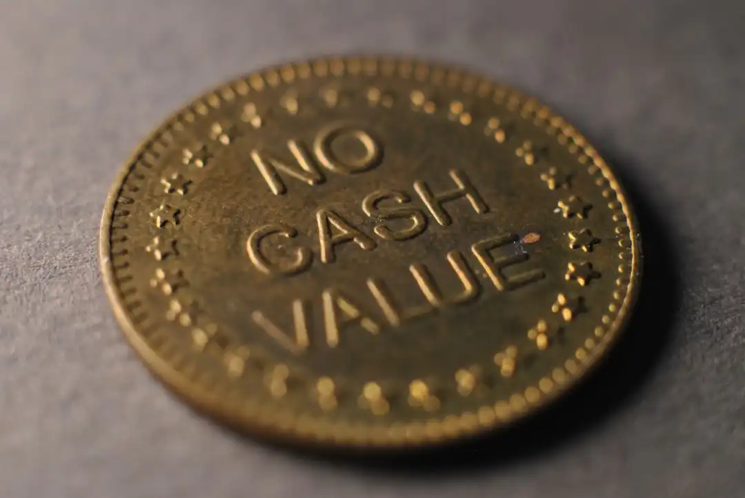 A close up of a coin on a table